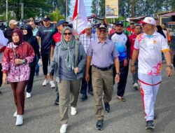 Pemerintah Kabupaten Aceh Jaya Gelar Senam Sehat, Jalan Santai, dan Bagikan Bendera Merah Putih untuk Memperingati HUT Ke-22